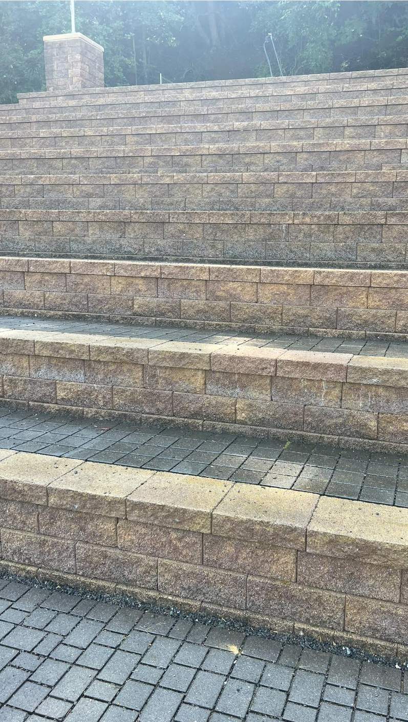 The same stone steps and paver landing after the wash